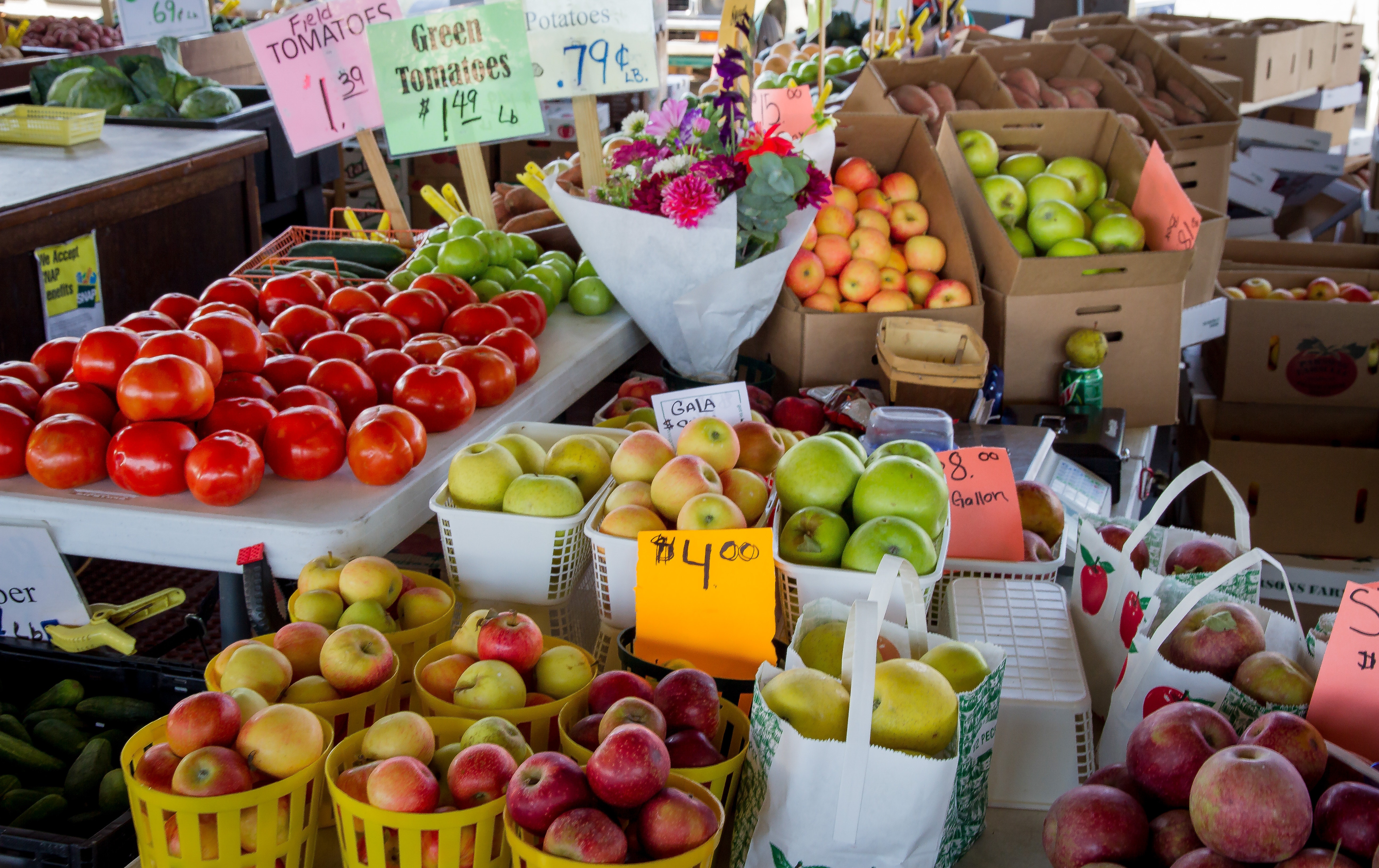 Locally grown vegetables and fruit for sale.